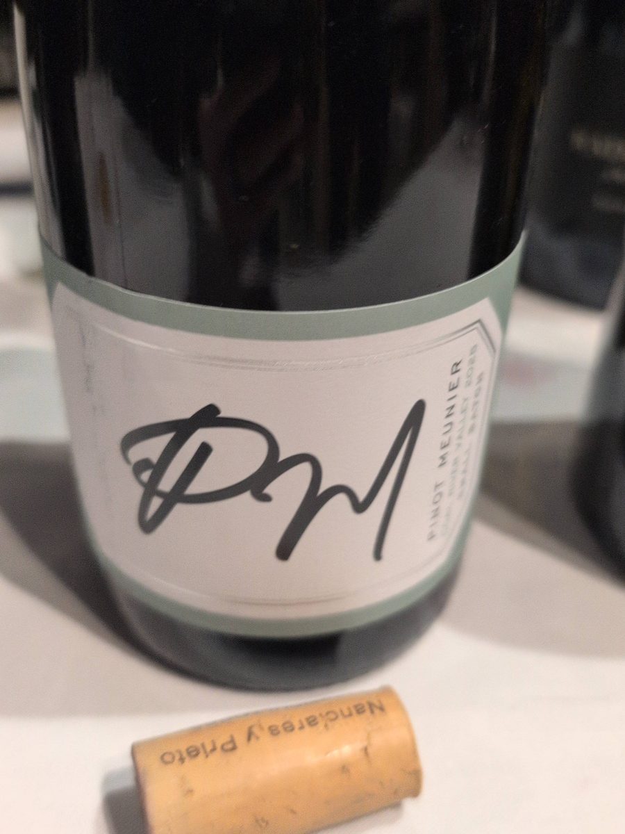 The Dalrymple Pinot Meunier bottle, a plain label carrying a large handwritten PM monogram