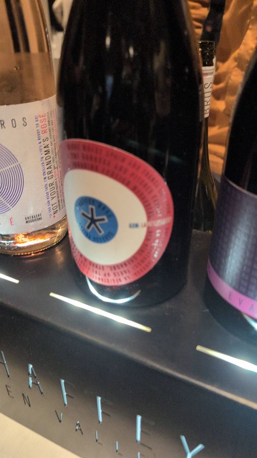 Three Chaffey Bros bottles on a branded display stand, including Not Your Grandma's Rosé