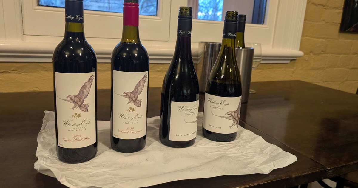 Five Whistling Eagle bottles lined up on a table before the tasting, from the 2021 Eagles Blood Shiraz through to the 2024 GSM